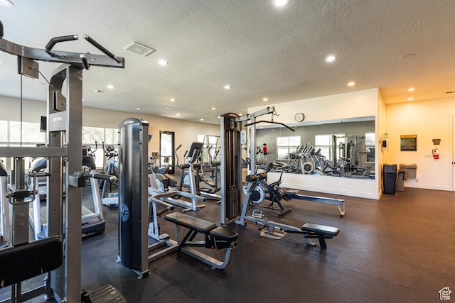 1012 N Cambria Dr, North Salt Lake, UT 84054 - gym featuring a textured ceiling and recessed lighting