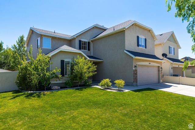 1012 N Cambria Dr, North Salt Lake, UT 84054 - traditional-style home featuring stucco siding, concrete driveway, and a garage
