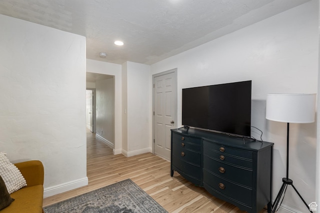 1012 N Cambria Dr, North Salt Lake, UT 84054 - living room with baseboards and light wood finished floors