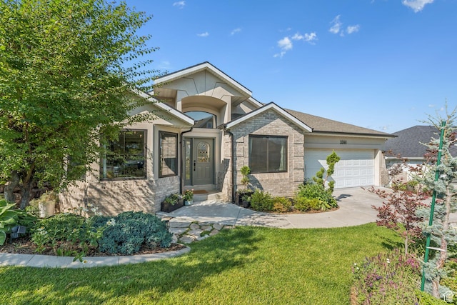 1044 S Terrace Dr E, Bountiful, UT 84010 - view of front of home with an attached garage, concrete driveway, and a front yard