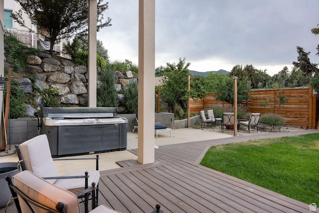 1044 S Terrace Dr E, Bountiful, UT 84010 - deck with a hot tub, a patio area, and a mountain view
