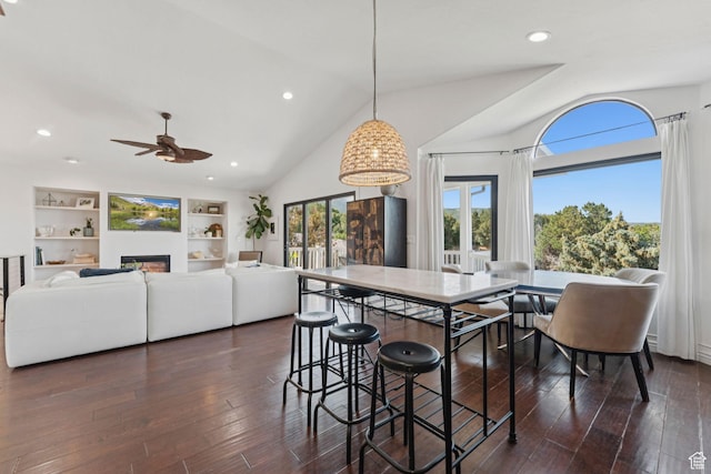 1044 S Terrace Dr E, Bountiful, UT 84010 - dining area featuring a ceiling fan, lofted ceiling, dark wood-style floors, a glass covered fireplace, and recessed lighting