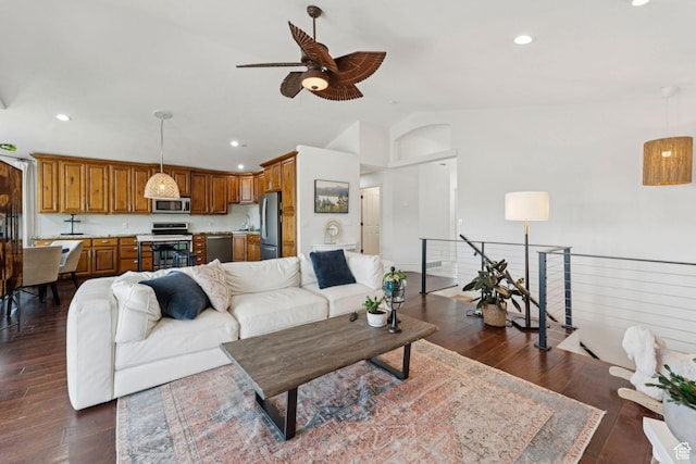 1044 S Terrace Dr E, Bountiful, UT 84010 - living area featuring lofted ceiling, a ceiling fan, dark wood finished floors, and recessed lighting