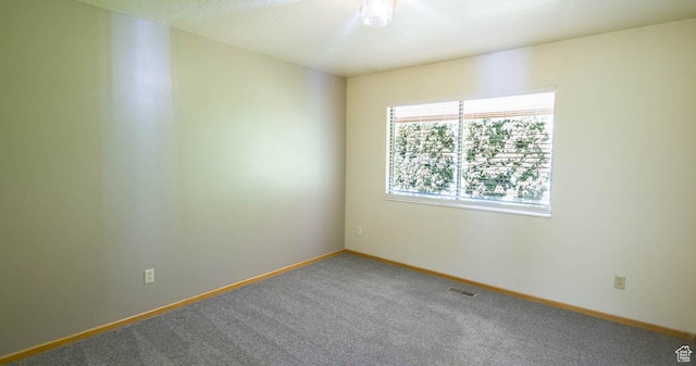 558 E 2025 N, North Ogden, UT 84414 - carpeted empty room featuring baseboards