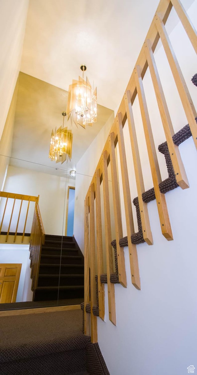 558 E 2025 N, North Ogden, UT 84414 - stairs featuring a chandelier