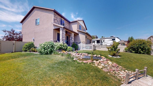 1605 W 1400 S, Vernal, UT 84078 - view of property exterior featuring stone siding, stucco siding, and a fenced backyard