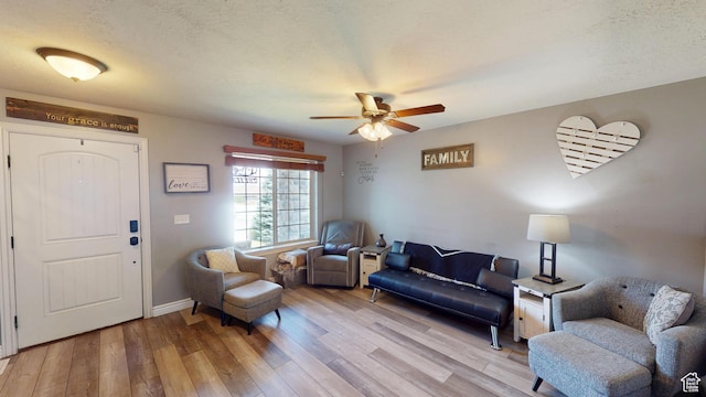 1605 W 1400 S, Vernal, UT 84078 - living area featuring light wood-style flooring and ceiling fan