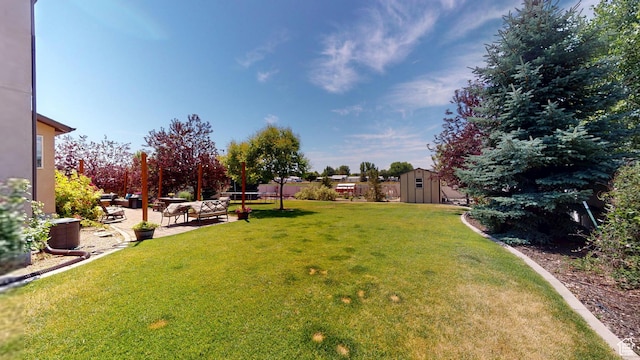 1605 W 1400 S, Vernal, UT 84078 - view of grassy yard with a storage unit, a patio area, and an outdoor hangout area