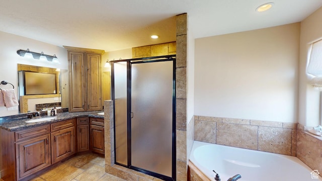 1605 W 1400 S, Vernal, UT 84078 - bathroom with a garden tub, vanity, a shower stall, and recessed lighting