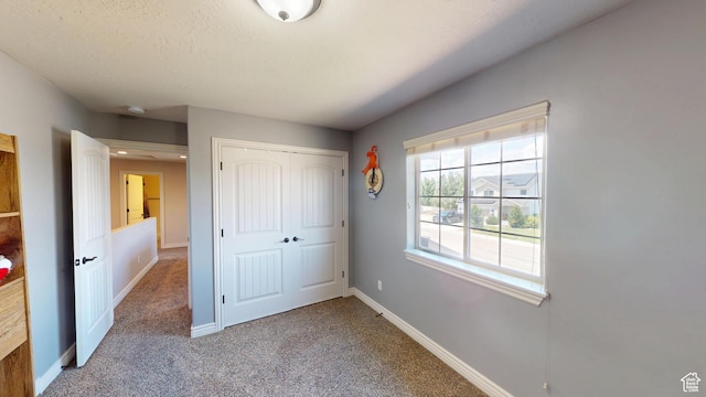 1605 W 1400 S, Vernal, UT 84078 - unfurnished bedroom with carpet floors and a closet