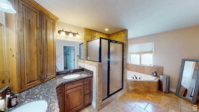 1605 W 1400 S, Vernal, UT 84078 - full bathroom with a shower stall, vanity, a bath, stone tile floors, and recessed lighting