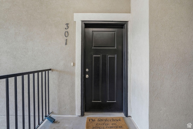 13054 S Tortola Dr W Unit 301, Herriman, UT 84096 - property entrance featuring stucco siding