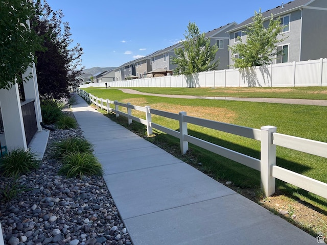 13054 S Tortola Dr W Unit 301, Herriman, UT 84096 - view of community featuring a residential view