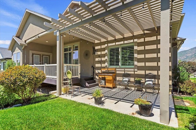 2681 E Sunshine Ct S, South Weber, UT 84405 - rear view of property with a pergola, stucco siding, a patio area, and a lawn