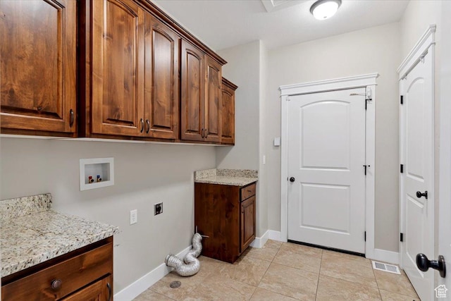 2681 E Sunshine Ct S, South Weber, UT 84405 - washroom featuring cabinet space, hookup for a washing machine, hookup for an electric dryer, and light tile patterned floors