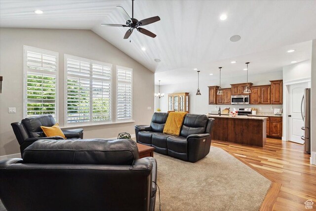 2681 E Sunshine Ct S, South Weber, UT 84405 - living area with a ceiling fan, light wood finished floors, recessed lighting, vaulted ceiling, and a chandelier