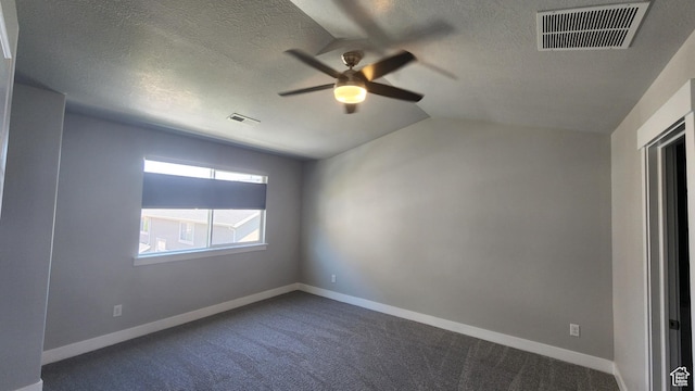 4442 W Hill Shadow Way S, Herriman, UT 84096 - spare room featuring ceiling fan, dark colored carpet, a textured ceiling, and vaulted ceiling