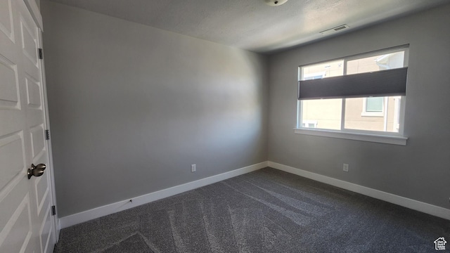 4442 W Hill Shadow Way S, Herriman, UT 84096 - unfurnished room with dark colored carpet and baseboards