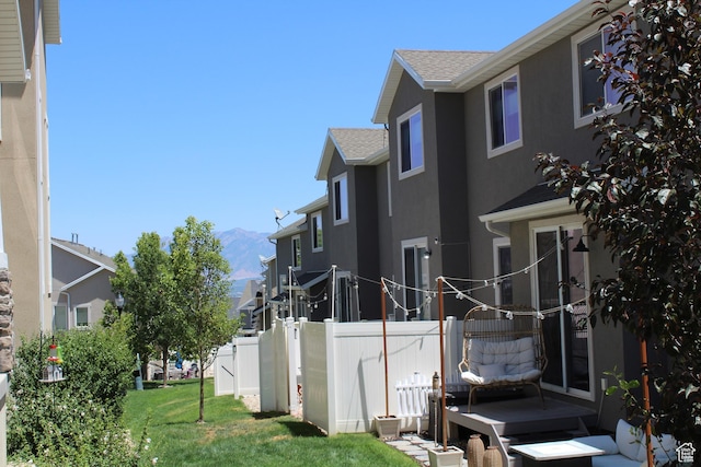 4442 W Hill Shadow Way S, Herriman, UT 84096 - view of property exterior featuring a mountain view, stucco siding, and a shingled roof