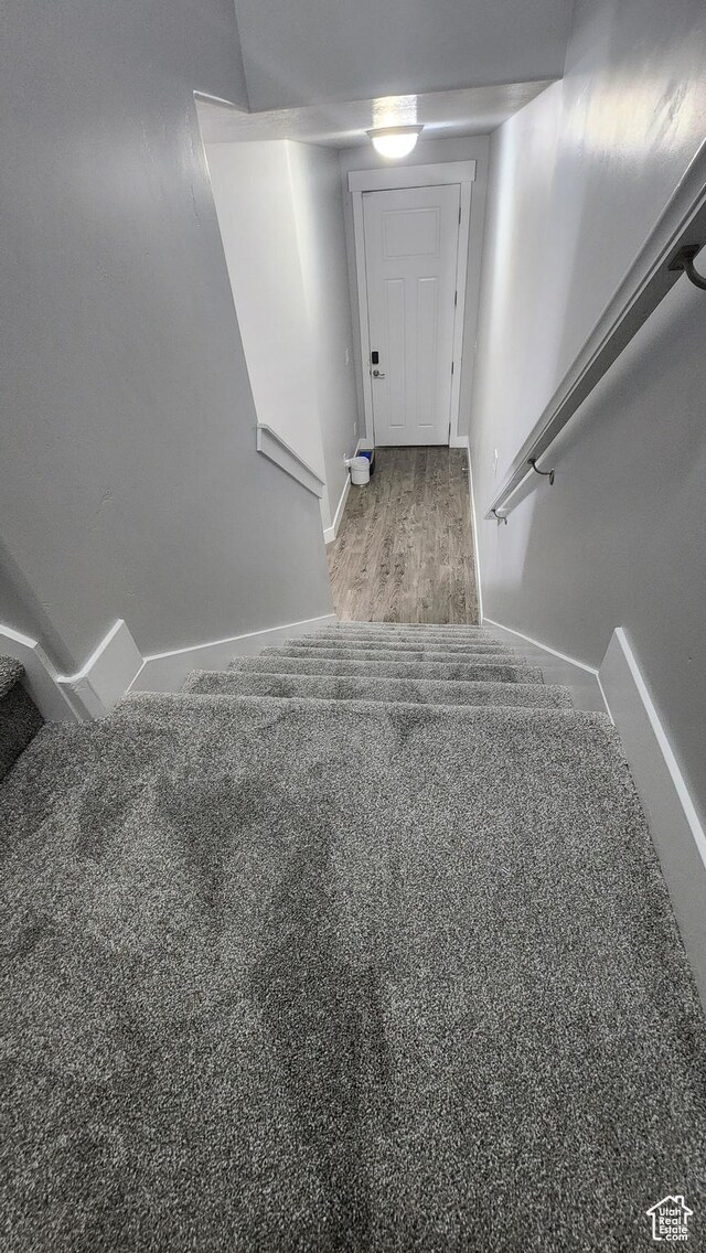 4442 W Hill Shadow Way S, Herriman, UT 84096 - stairs featuring baseboards and wood finished floors