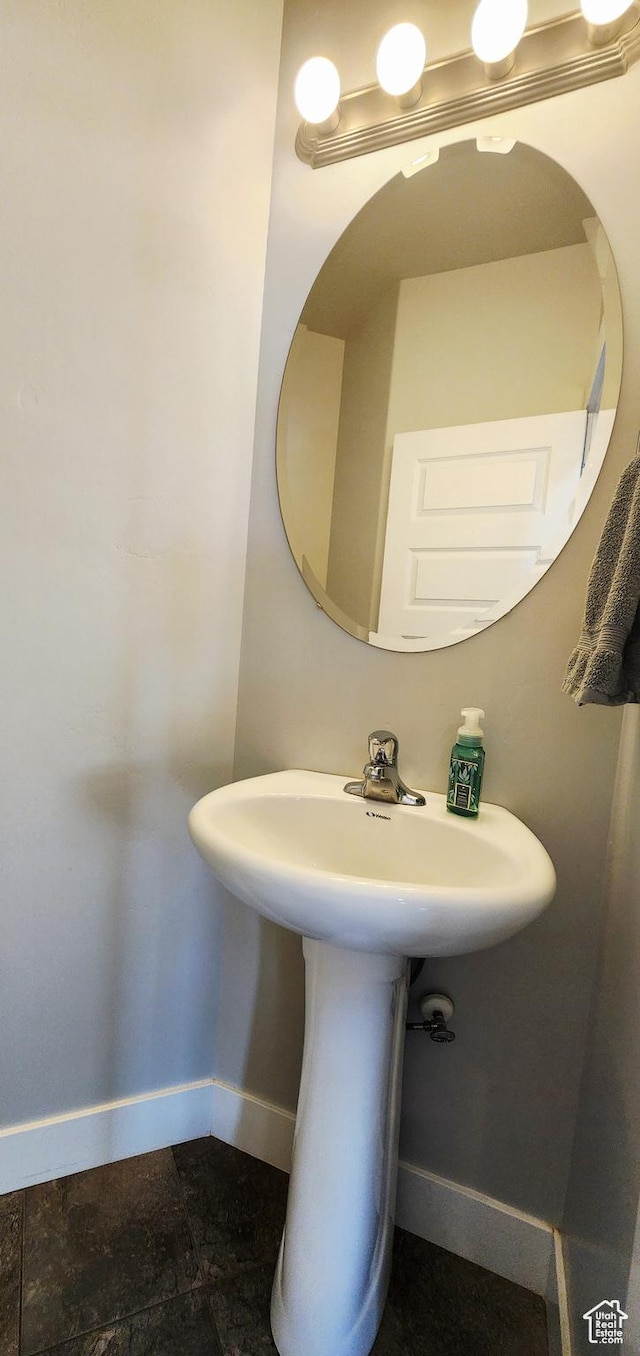 4442 W Hill Shadow Way S, Herriman, UT 84096 - bathroom with baseboards and a sink