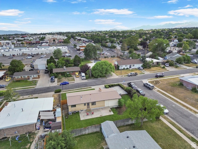 1908 W Champagne Ave, Taylorsville, UT 84129 - aerial perspective of suburban area with a mountain backdrop