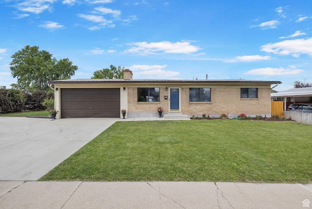 1908 W Champagne Ave, Taylorsville, UT 84129 - ranch-style house featuring a garage, a chimney, concrete driveway, and brick siding