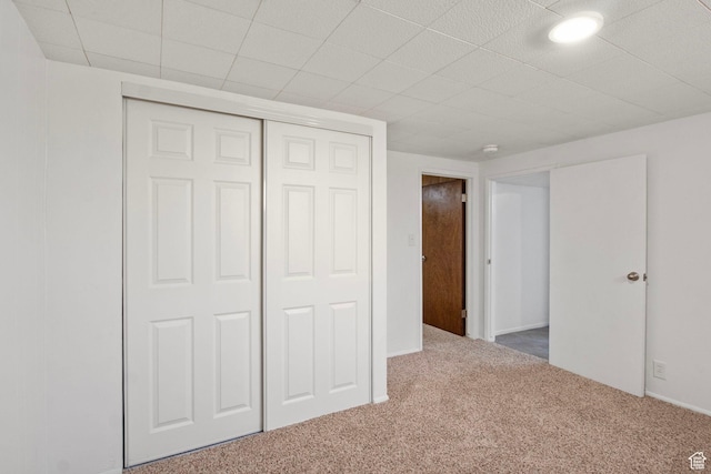 1908 W Champagne Ave, Taylorsville, UT 84129 - unfurnished bedroom featuring carpet floors and a closet
