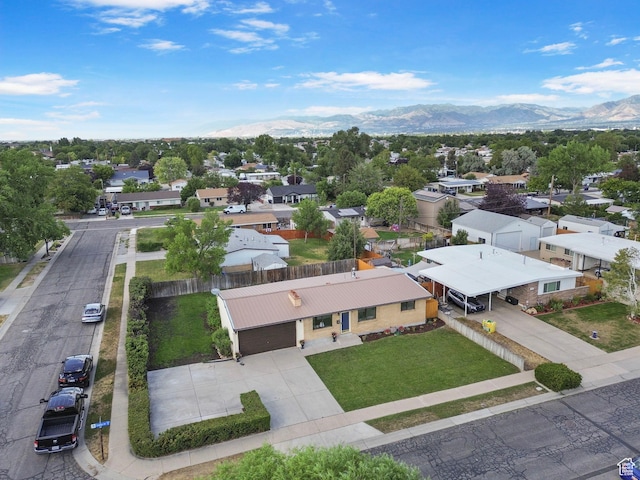 1908 W Champagne Ave, Taylorsville, UT 84129 - aerial perspective of suburban area with mountains