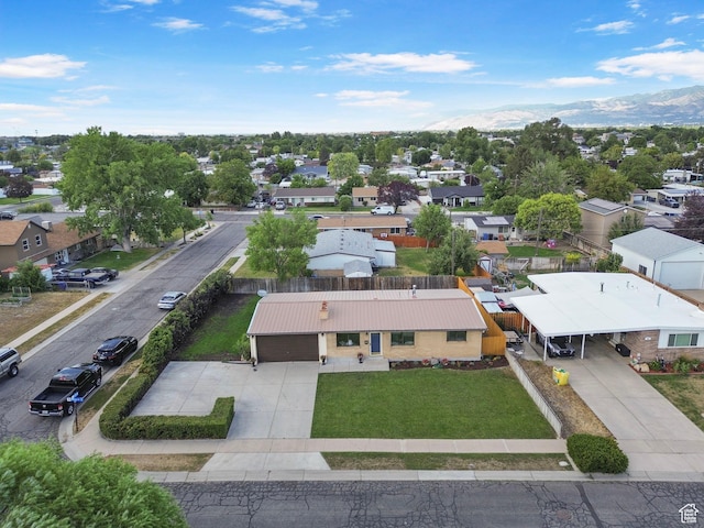 1908 W Champagne Ave, Taylorsville, UT 84129 - aerial perspective of suburban area with a mountainous background
