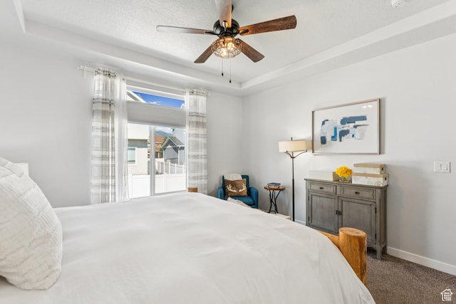 1076 S Meadow Walk Ln, Heber City, UT 84032 - bedroom featuring a tray ceiling, carpet floors, and ceiling fan