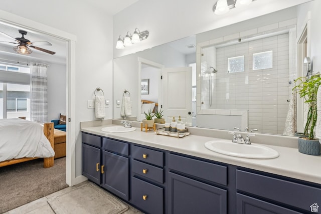 1076 S Meadow Walk Ln, Heber City, UT 84032 - full bathroom with double vanity, a ceiling fan, tiled shower, connected bathroom, and tile patterned flooring