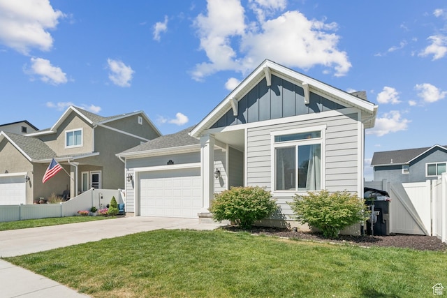 1076 S Meadow Walk Ln, Heber City, UT 84032 - view of front of home featuring driveway, an attached garage, and board and batten siding