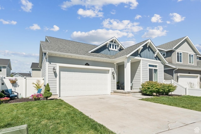1076 S Meadow Walk Ln, Heber City, UT 84032 - view of front of property featuring driveway, board and batten siding, and a garage