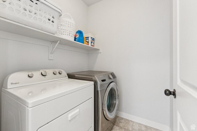 1076 S Meadow Walk Ln, Heber City, UT 84032 - laundry room with washer and dryer and baseboards