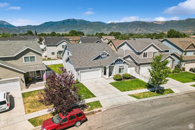 1076 S Meadow Walk Ln, Heber City, UT 84032 - aerial perspective of suburban area with a mountain backdrop