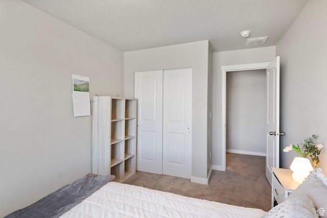 1017 W Coyote Gulch Way S Unit 117, Bluffdale, UT 84065 - carpeted bedroom with baseboards and a closet