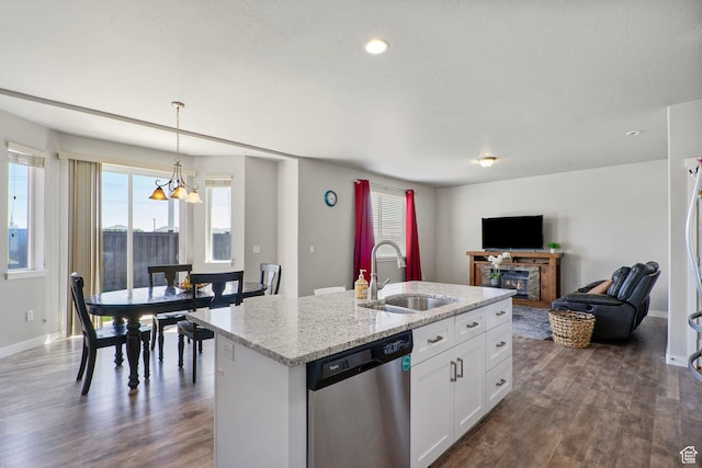 1017 W Coyote Gulch Way S Unit 117, Bluffdale, UT 84065 - kitchen with dishwasher, dark wood finished floors, white cabinets, and healthy amount of natural light