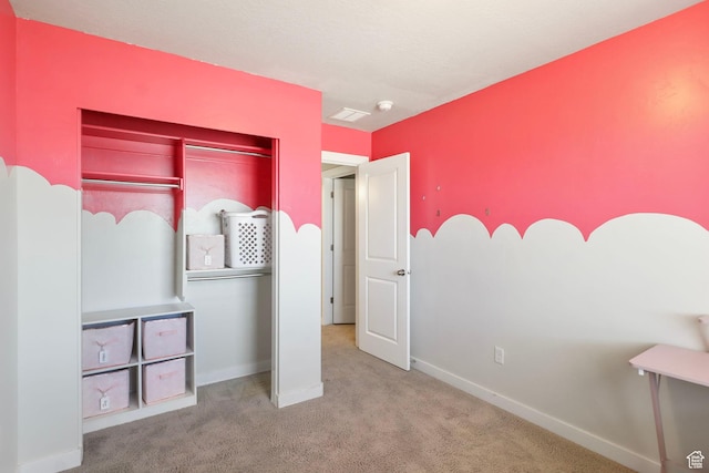 1017 W Coyote Gulch Way S Unit 117, Bluffdale, UT 84065 - unfurnished bedroom with carpet floors and baseboards