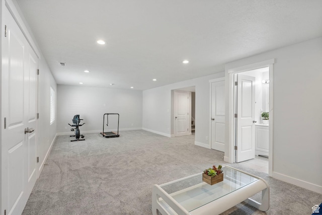 1017 W Coyote Gulch Way S Unit 117, Bluffdale, UT 84065 - living area featuring light carpet and recessed lighting