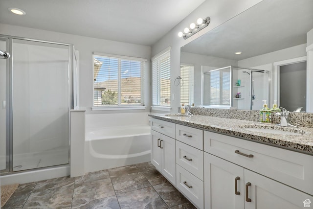 1017 W Coyote Gulch Way S Unit 117, Bluffdale, UT 84065 - full bath featuring double vanity, a shower stall, a bath, and recessed lighting