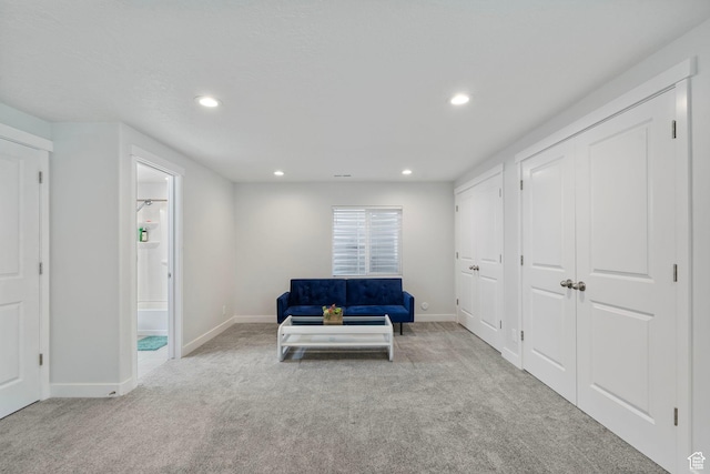 1017 W Coyote Gulch Way S Unit 117, Bluffdale, UT 84065 - living area featuring carpet and recessed lighting