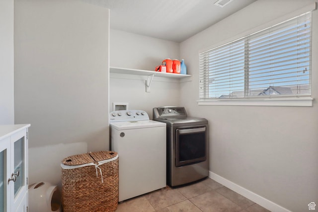 1017 W Coyote Gulch Way S Unit 117, Bluffdale, UT 84065 - laundry room with washer and dryer and light tile patterned flooring