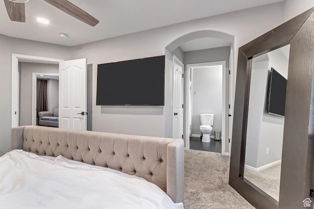 3699 S Botticelli Ct Unit C, Salt Lake City, UT 84119 - bedroom with arched walkways, carpet floors, and ensuite bath