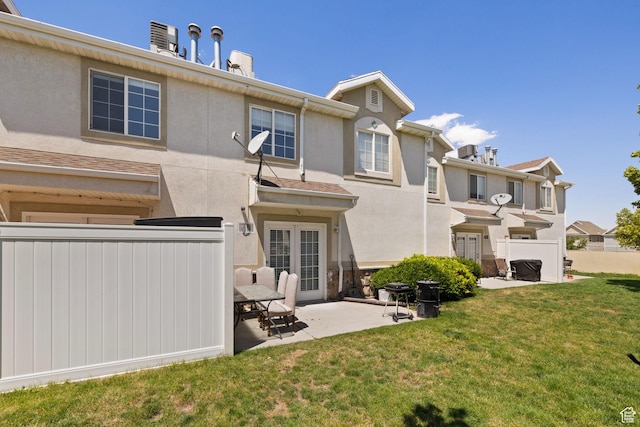 3699 S Botticelli Ct Unit C, Salt Lake City, UT 84119 - back of property featuring a patio, stucco siding, and a chimney