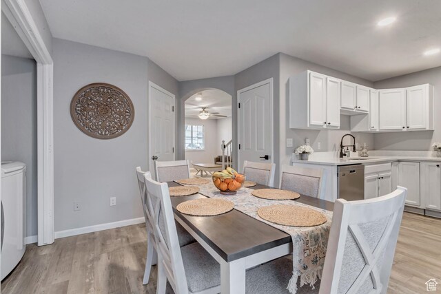 3699 S Botticelli Ct Unit C, Salt Lake City, UT 84119 - dining area featuring separate washer and dryer, light wood-style floors, ceiling fan, and recessed lighting