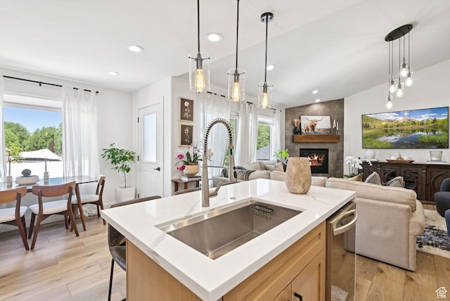 273 N 200 W Unit 1, Kamas, UT 84036 - kitchen with open floor plan, a large fireplace, light wood-type flooring, stainless steel dishwasher, and recessed lighting