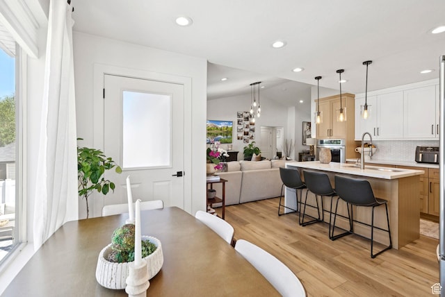 273 N 200 W Unit 1, Kamas, UT 84036 - dining room with lofted ceiling, light wood finished floors, and recessed lighting