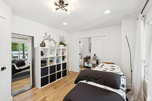 273 N 200 W Unit 1, Kamas, UT 84036 - bedroom with light wood-style floors, a chandelier, recessed lighting, and a closet