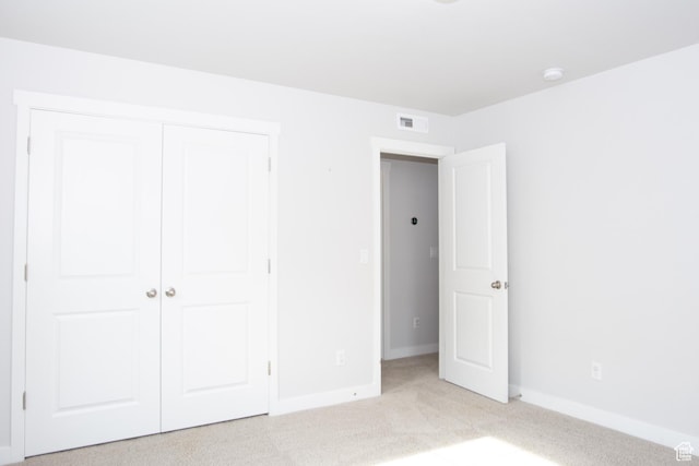11511 S Pebble Pond Rd, South Jordan, UT 84009 - unfurnished bedroom with light colored carpet and a closet
